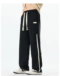 Black casual loose straight sweatpants with white side stripes and drawstrings for daily wear.