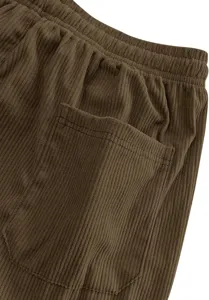 Brown corduroy men pants elastic waist pocket detail view closeup fabric texture