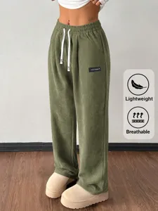 Men's green corduroy casual pants, loose fit straight trousers with adjustable drawstring.
