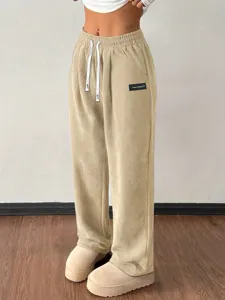 Casual corduroy wide-leg pants for women with comfortable drawstring waist and stylish pockets.