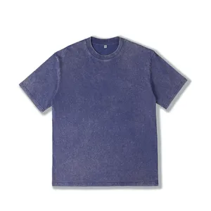 Close-up of the vintage washed fabric texture, classic crew neck and clean short sleeves.