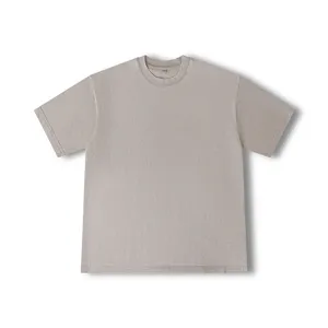 Detailed view of the distressed vintage washed oversized short sleeve t-shirt in dark grey.