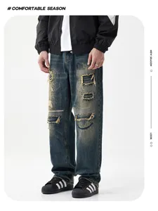 Detailansicht von Herren Vintage blauem Used Look Patchwork Streetwear Jeans Denim Hose.