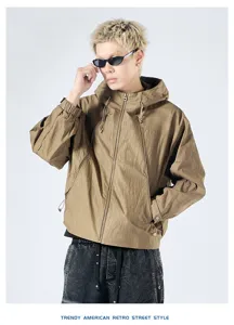 Close-up details of retro hooded workwear jacket, long sleeve loose casual design.