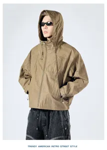 Retro hooded tooling jacket detail view, showing zip front, drawstring and loose fit.