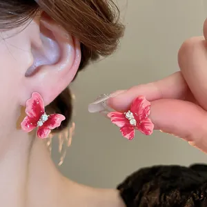 Sweet pink butterfly earrings with sparkling rhinestones, perfect for summer chic and cute style.