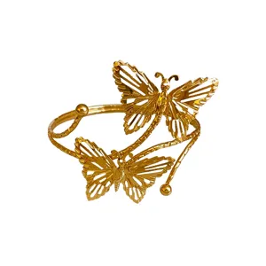 Bracciale rigido aperto dorato con un bel design a doppia farfalla, gioiello di moda chic.