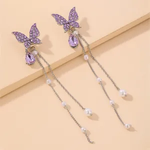 Sweet summer butterfly dangle earrings with purple rhinestones and pearls, elegant fairy style.