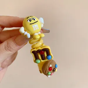 Detailed close-up view of cute dopamine style telephone cord hair tie with cartoon character.