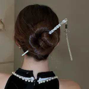 Épingle à cheveux en bambou cristal style chinois avec gland éventail, accessoire élégant.