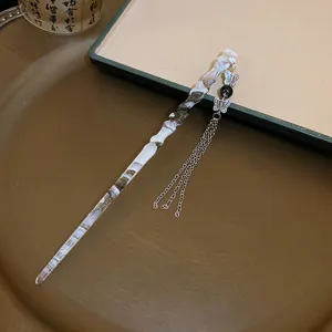 Bâtonnet de cheveux style chinois avec gland papillon, accessoire vintage élégant.