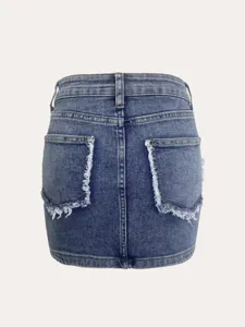 Women light blue denim mini skirt with raw edge pocket detail rear view product detail shot.