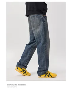 Jeans uomo vintage lavaggio delavé, pantaloni denim larghi casual stile streetwear autunno.
