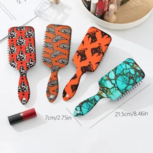 Western cowboy style paddle hair brush set with turquoise and cowhide print massage combs.