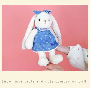 Cute plush rabbit doll with blue floral dress, soft stuffed bunny toy for kids and gift.