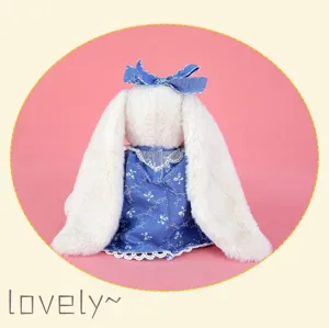 Easter long eared plush rabbit doll with cute blue floral dress and back view display