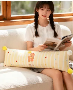 Cartoon striped long bolster pillow detailed view, cute bear graphic and soft plush texture.