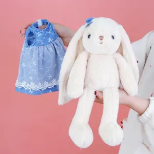 Easter lop-eared bunny plush toy with removable blue floral dress, soft stuffed animal doll.