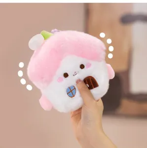 Cute plush house keychain accessory, soft stuffed doll pendant for bags and car decoration.