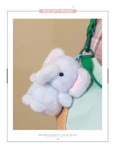 Cute blue plush elephant keychain pendant, soft stuffed animal bag charm for keys and backpacks.
