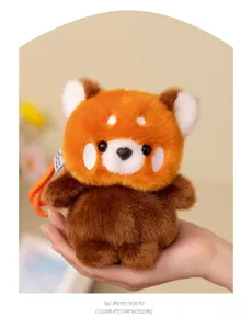 Red panda plush keychain detail view, soft cute animal hanging ornament for bags and keys.