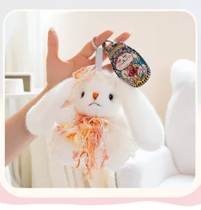 Cute Lolita style bunny plush keychain with floral dress and lucky cat key case charm.