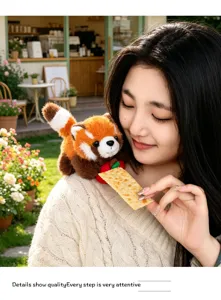 Cute red panda magnetic shoulder plush toy with apple accessory for cozy daily style.