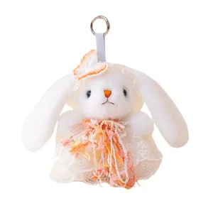 Cute Lolita style plush rabbit keychain with floral dress, soft stuffed animal bag pendant decoration.