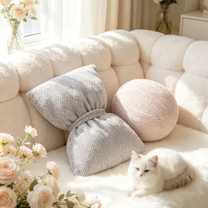 Cute bow plush sofa pillow and round cushion, soft cozy home decor for living room or bedroom.