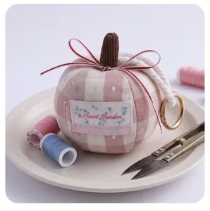 Cute plaid plush apple car pendant detail showing soft fabric texture and sweet garden label.