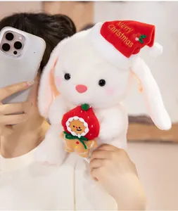Juguete de peluche de conejo de Navidad con sombrero y muneca de pan de jengibre