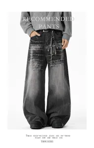 Detailed view of vintage washed distressed baggy wide leg denim jeans with unique design.