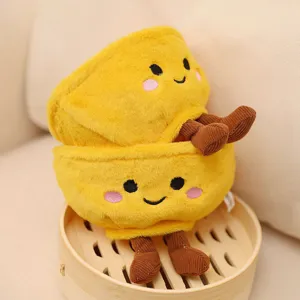 Detailed close-up shot of the cute golden rice bowl plush toy with cute embroidered facial expressions.