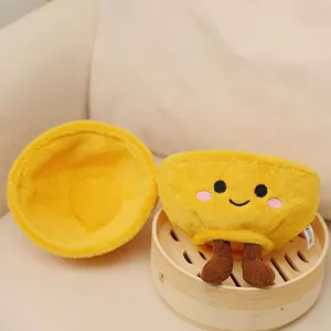 Cute golden rice bowl plush toy with cute face and miniature bamboo steamer decor for gift.