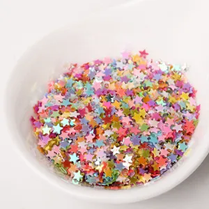 Close-up detail of 3mm colorful star sequins glitter, perfect for nail art and DIY epoxy crafts.