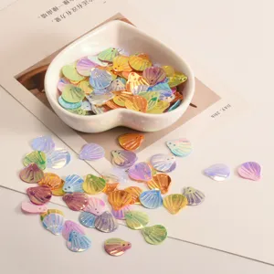 Colorful iridescent shell sequins for DIY crafts, clothing decoration and children stage costumes.