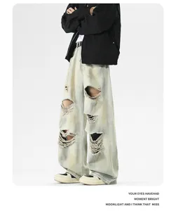 Vaqueros anchos desgastados con roturas, pantalón streetwear vintage lavado para todos.