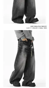 Black washed baggy denim trousers detail, casual retro wide leg pants pocket and hem view.