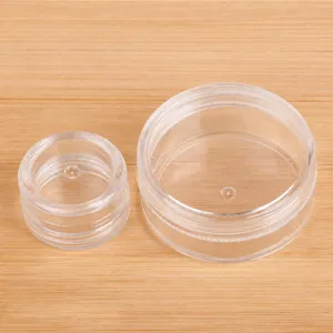 Juego de tarros de almacenamiento de plástico transparente con tapa para cuentas y joyas.