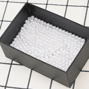 Off-white plastic imitation pearl loose beads with holes, perfect for DIY handmade jewelry crafting.