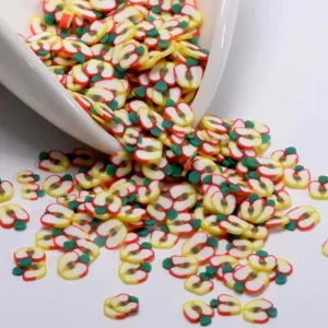Rodajas de arcilla polimérica de manzana colorida para nail art, resina y decoraciones DIY.