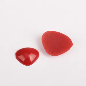 Red triangle DIY doll eyes and noses for crochet plush animals handmade craft materials detail shot