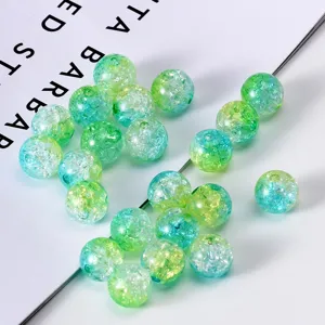 Close-up detail of two-color crackle glass beads, colorful DIY bracelet necklace accessories.