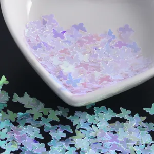 Iridescent butterfly nail art sequins, holographic glitter flakes for DIY crafts and manicure.