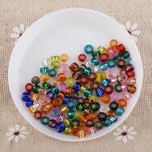 Colorful mixed seed beads and tube beads detail for DIY jewelry making crafts and handmade bracelets.