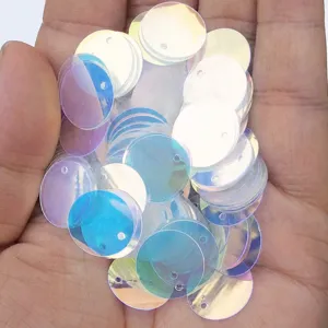 Transparent iridescent round DIY sequins with side holes for clothing sewing and crafts decor.
