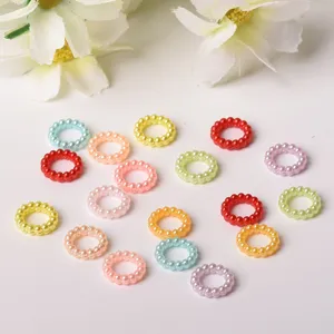 Colorful ABS imitation pearl rings detail view, perfect DIY phone case crafting accessories.