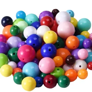 Perles rondes acryliques colorees avec trous pour fabrication bijoux colliers bracelets.