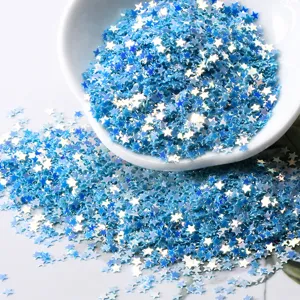 Blue star glitter sequins close-up detail, perfect for resin DIY craft and nail art decoration.