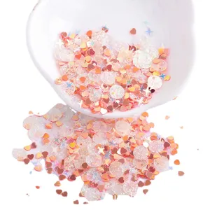 Mixed glitter sequins set with round, heart and star shapes for DIY crafts and resin art.